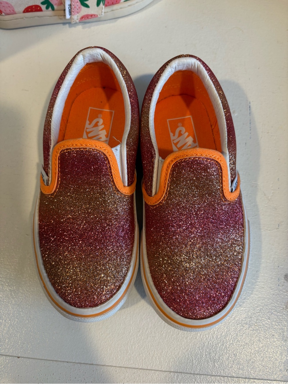 Vans Kids Glitter Slip-On Sneakers in Pink and Orange